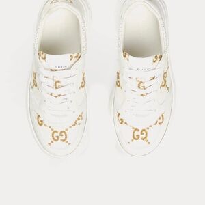 Gucci Women's Sneakers in White and Gold